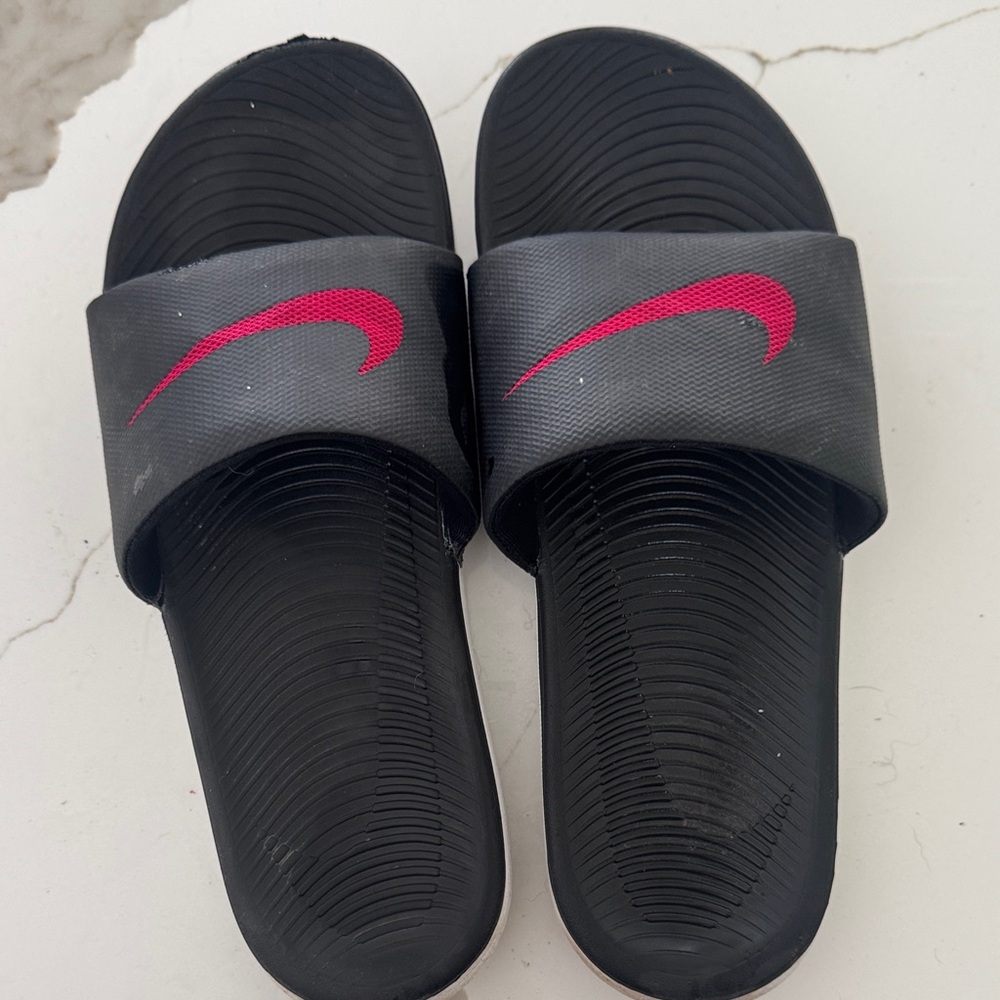 Nike Black Slides with Pink Swoosh Accent
